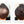 Before and after image of a man with short dark brown hair with a bald spot on his crown