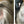 Before and after image of a person with straight silver hair that is thinning on the crown