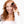 Image of a woman with reddish-brown hair holding a Caboki 30g